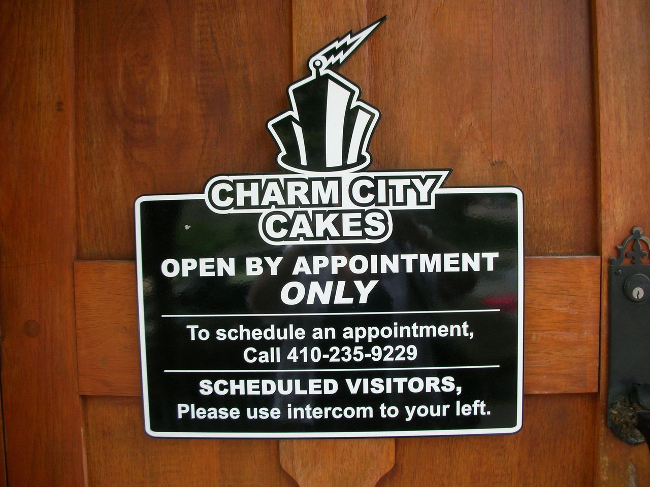 Charm City Cakes sign